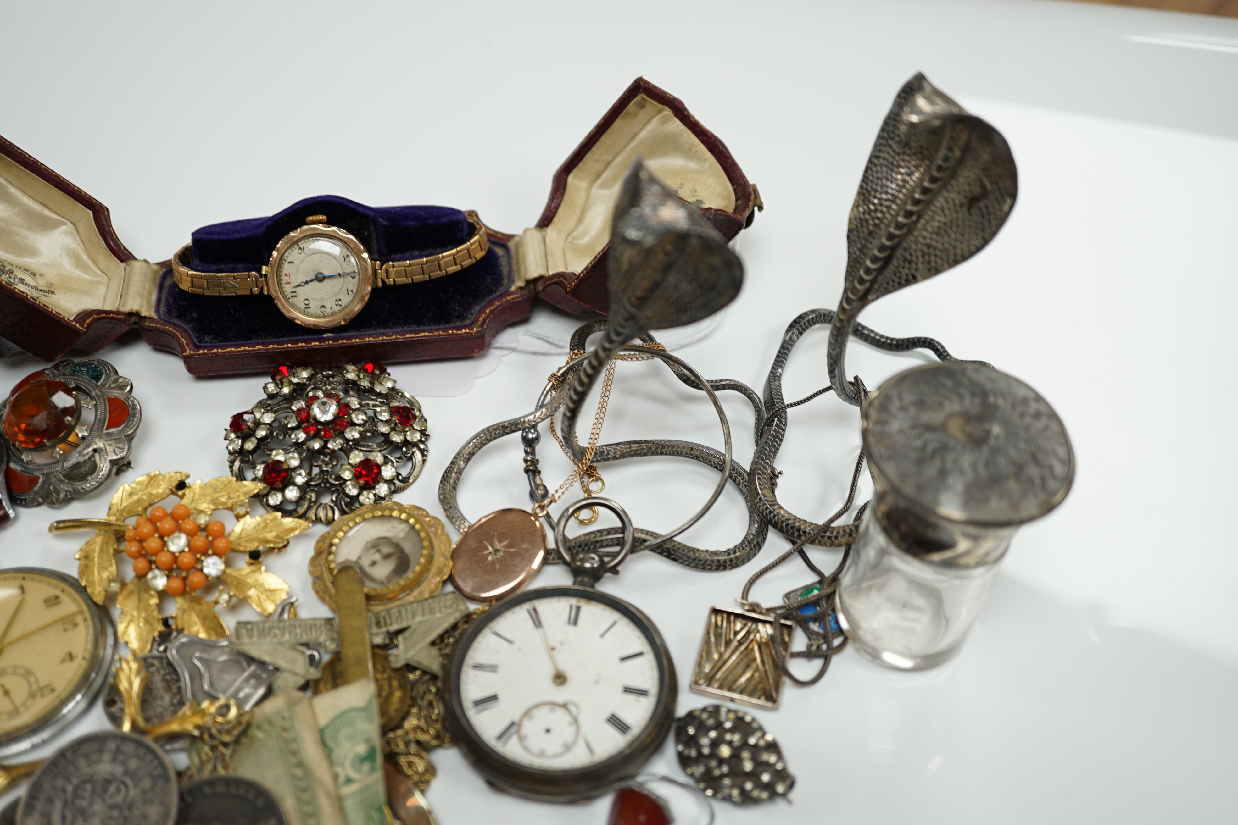 A quantity of assorted mainly costume and other jewellery and a lady's 9ct gold manual wind wrist watch, on a 9ct gold bracelet.